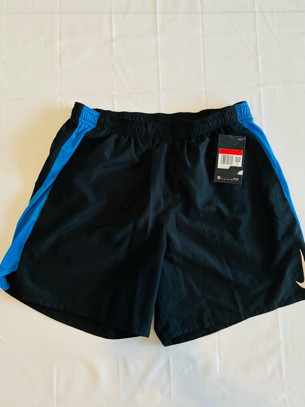 Nike Black Athletic Shorts with Blue Side Stripes